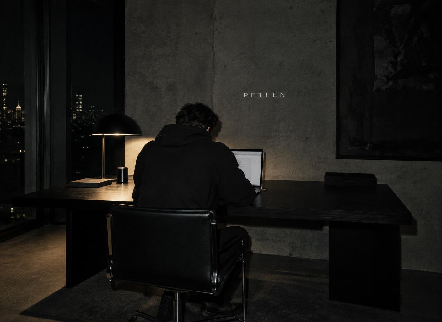 Working late in a dark minimal PETLÈN studio